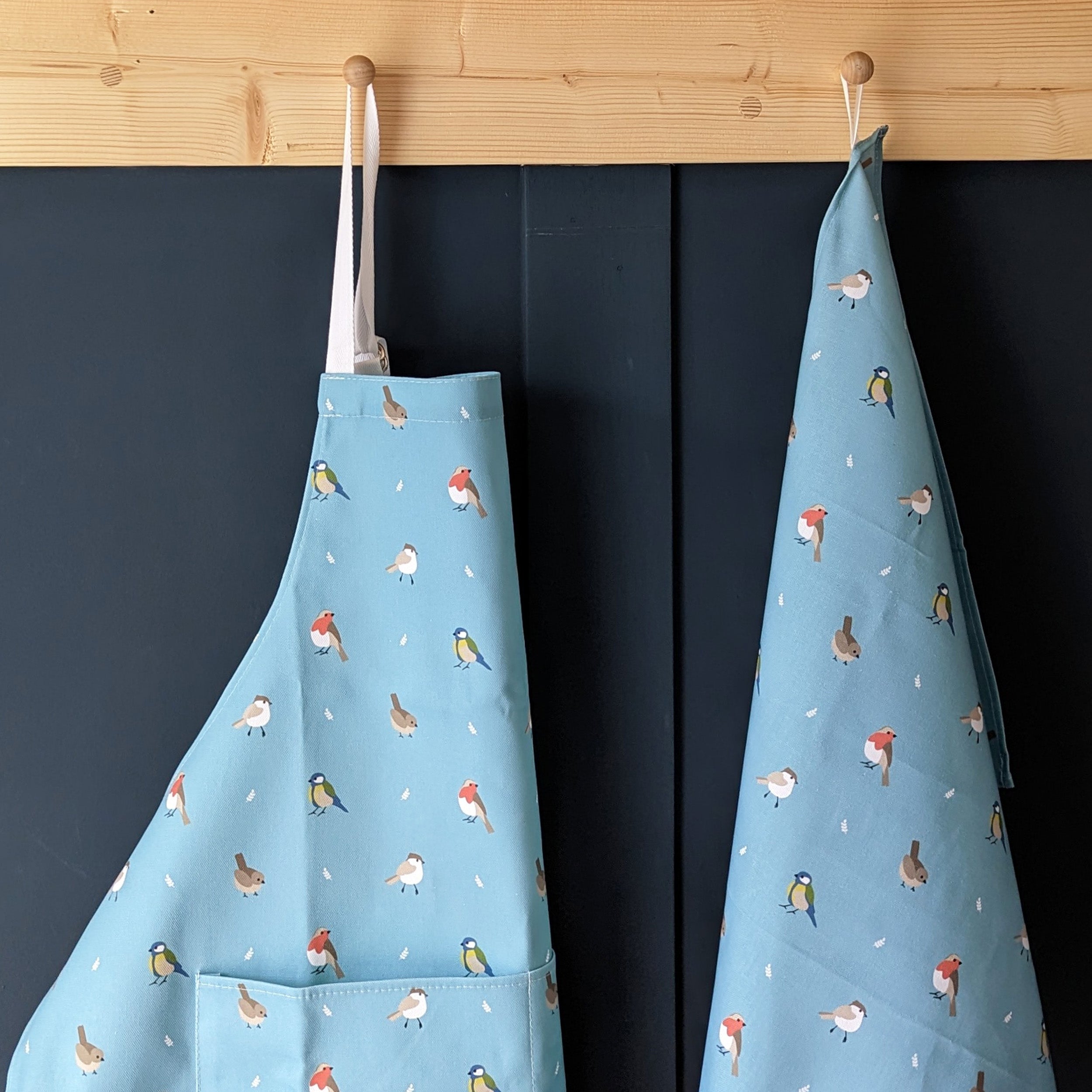 Teal Cotton Tea Towel and apron featuring British Garden Birds