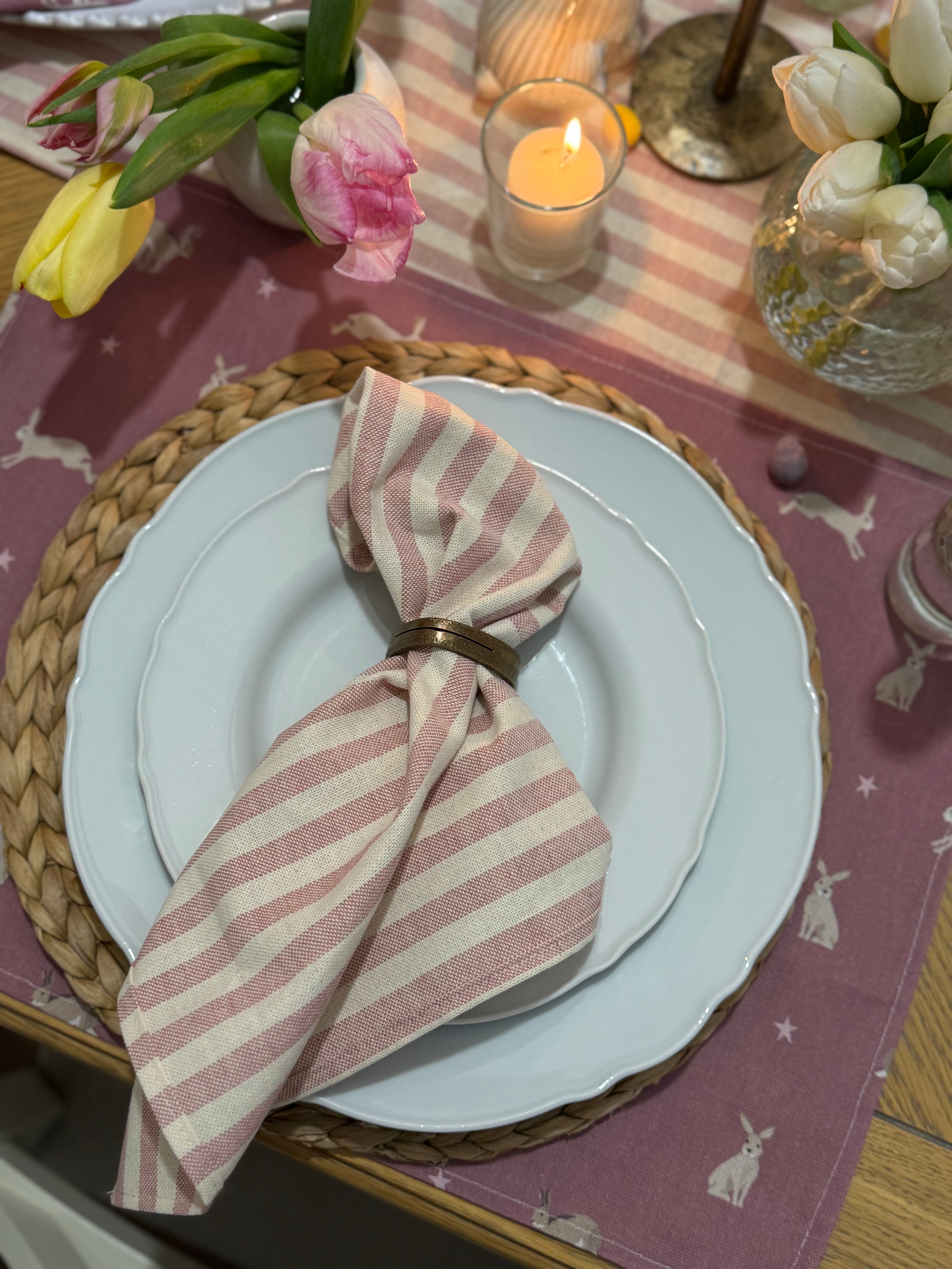 Pink Hare fabric placemat on a decorative tablesetting