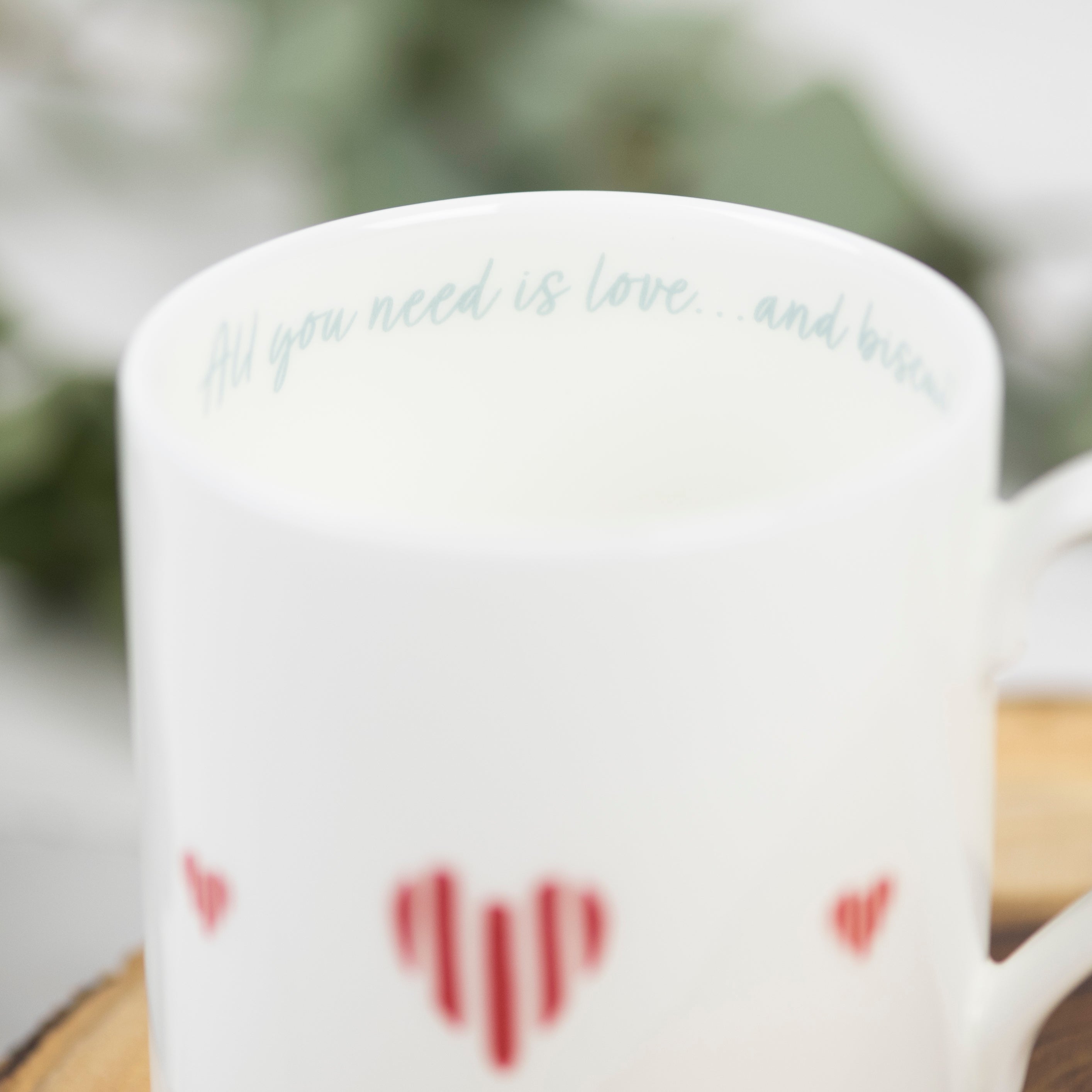 Text All You Need Is Love... and Biscuits on Hearts Fine Bone China Mug