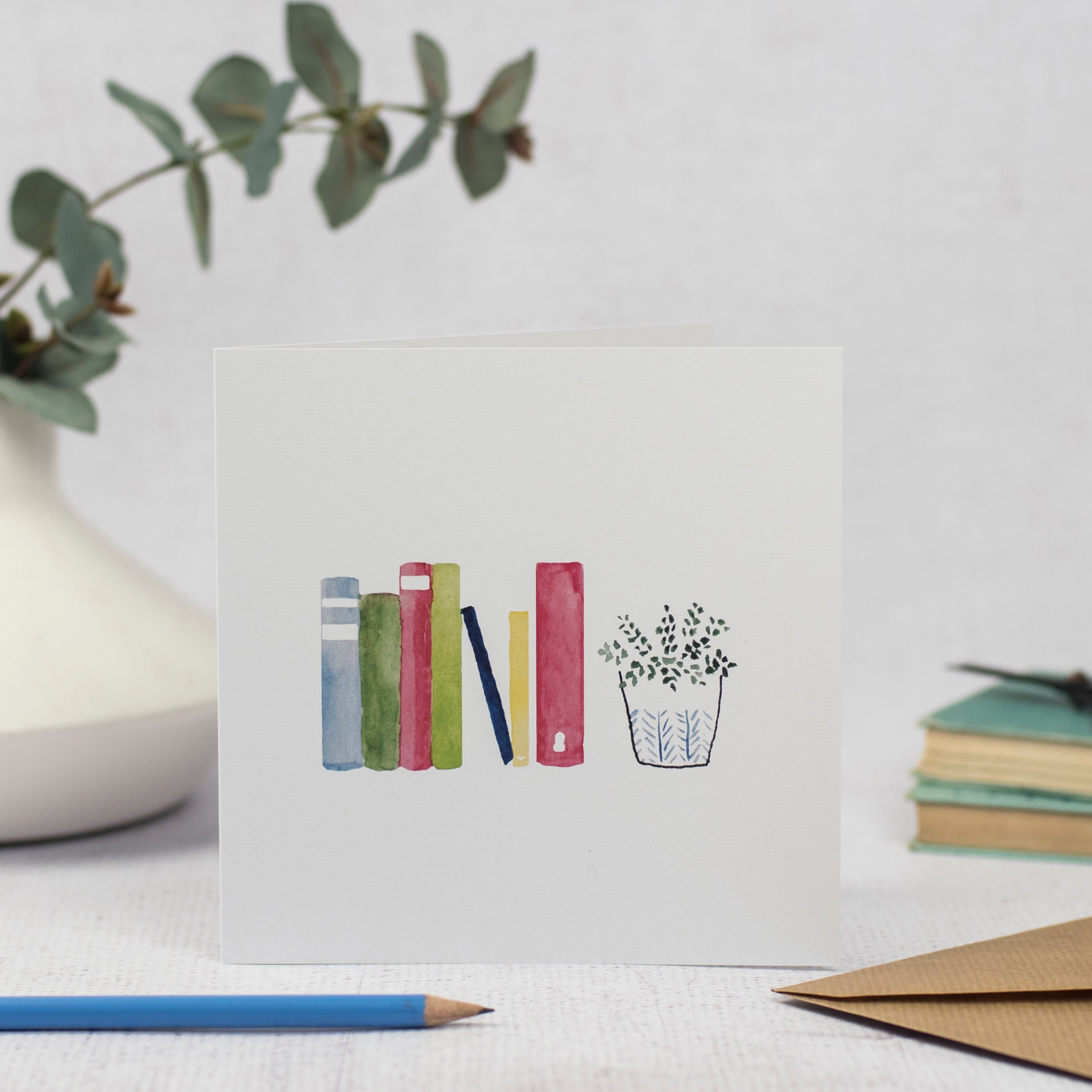 books and plant shelfie card