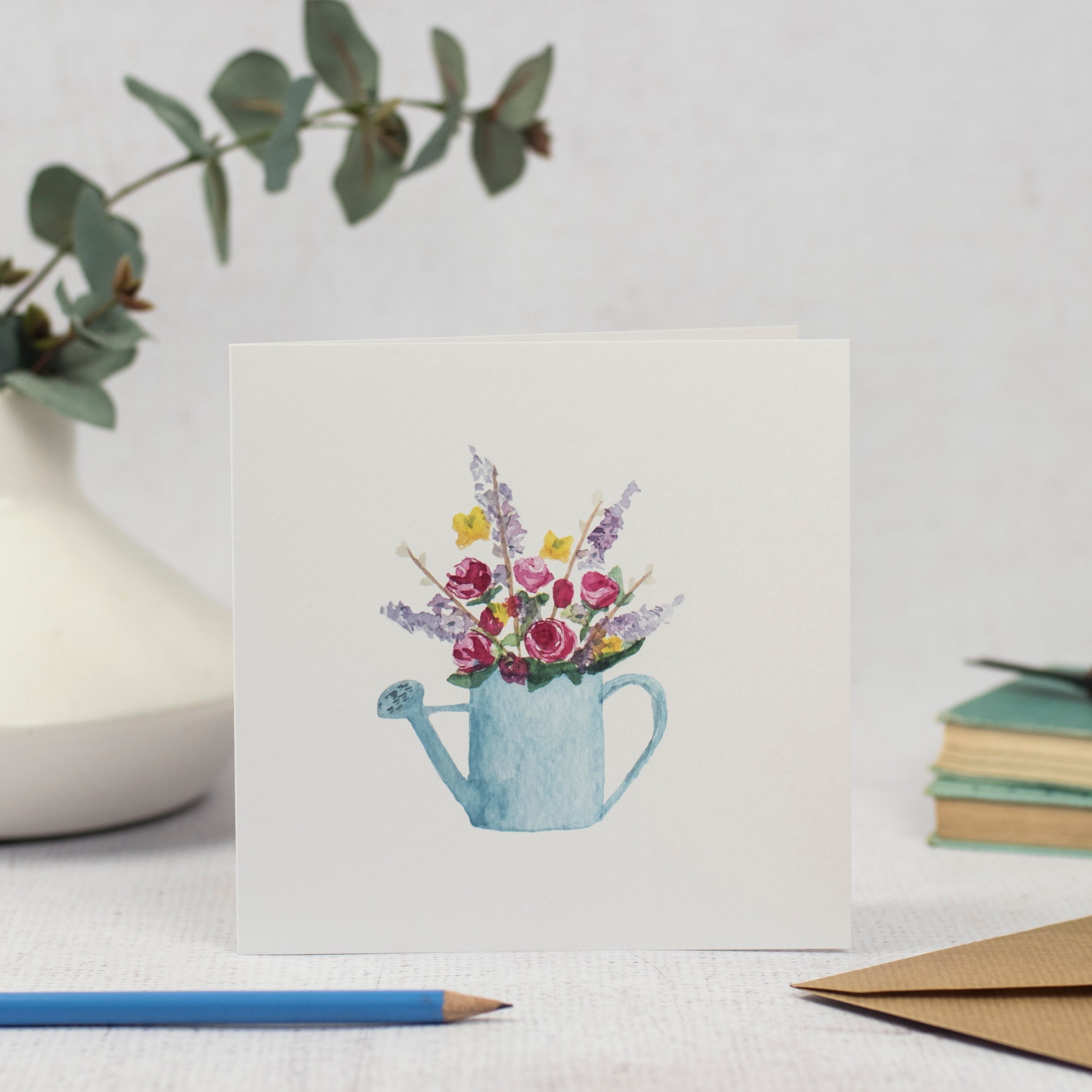 Wateing can and flowers card