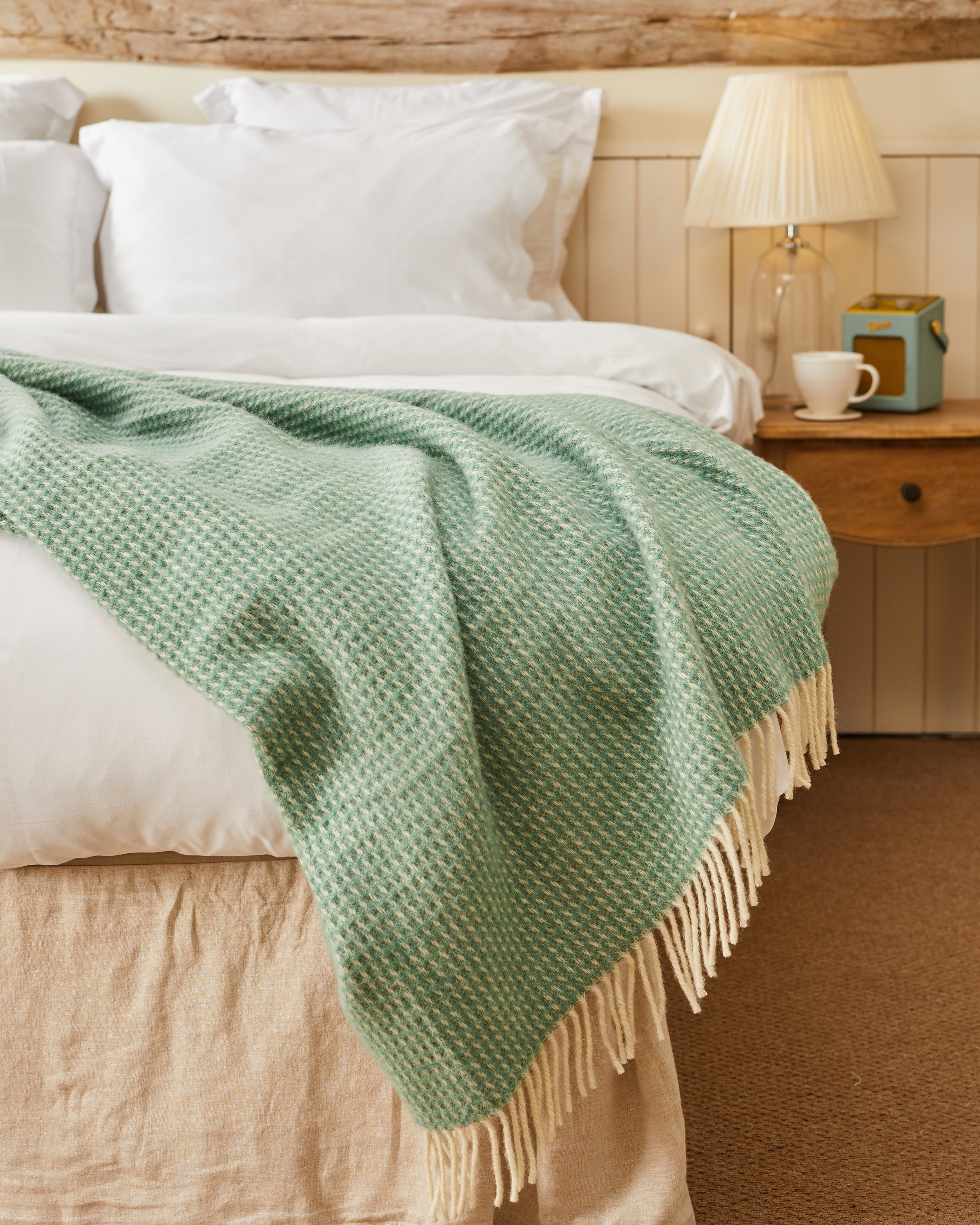 Sea Green blanket in a country bedroom