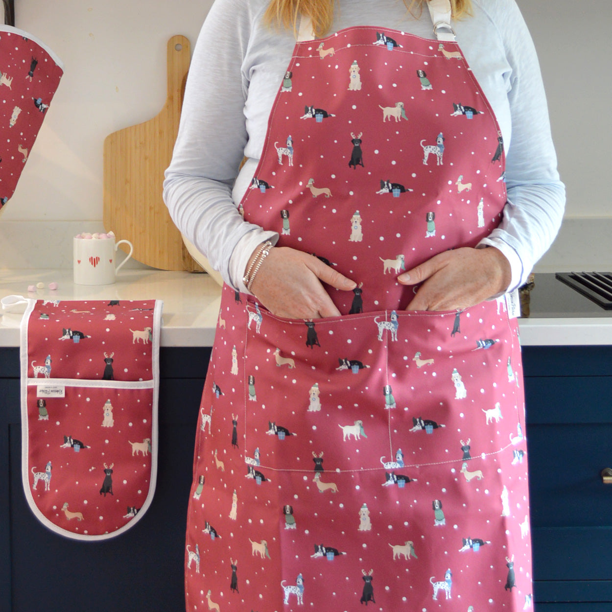 Red Christmas Dogs Apron by Rebecca Pitcher