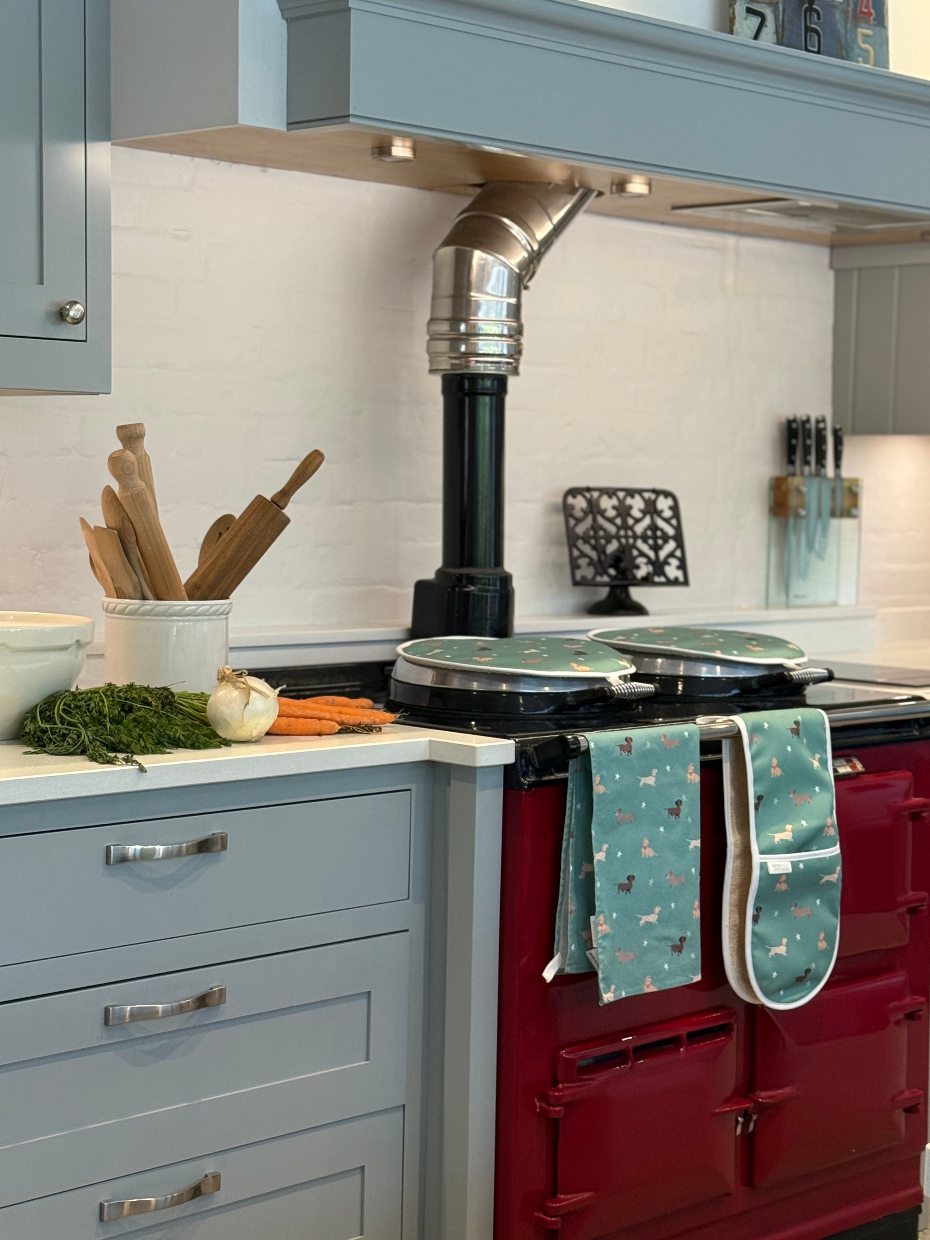 Green dachshund design kitchen textiles in a country kitchen