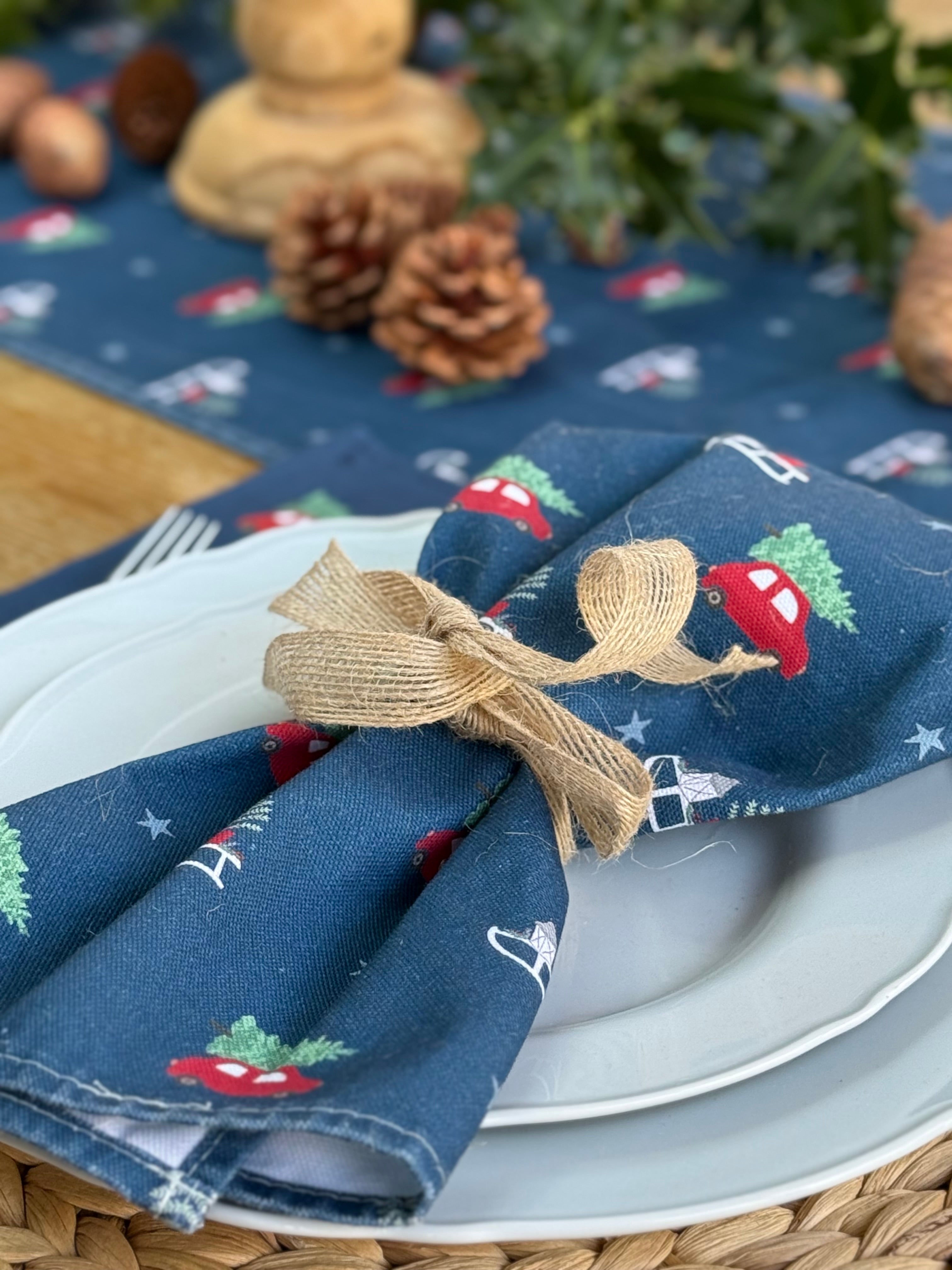 Napkin with Christmas design on a plate with decorative elements