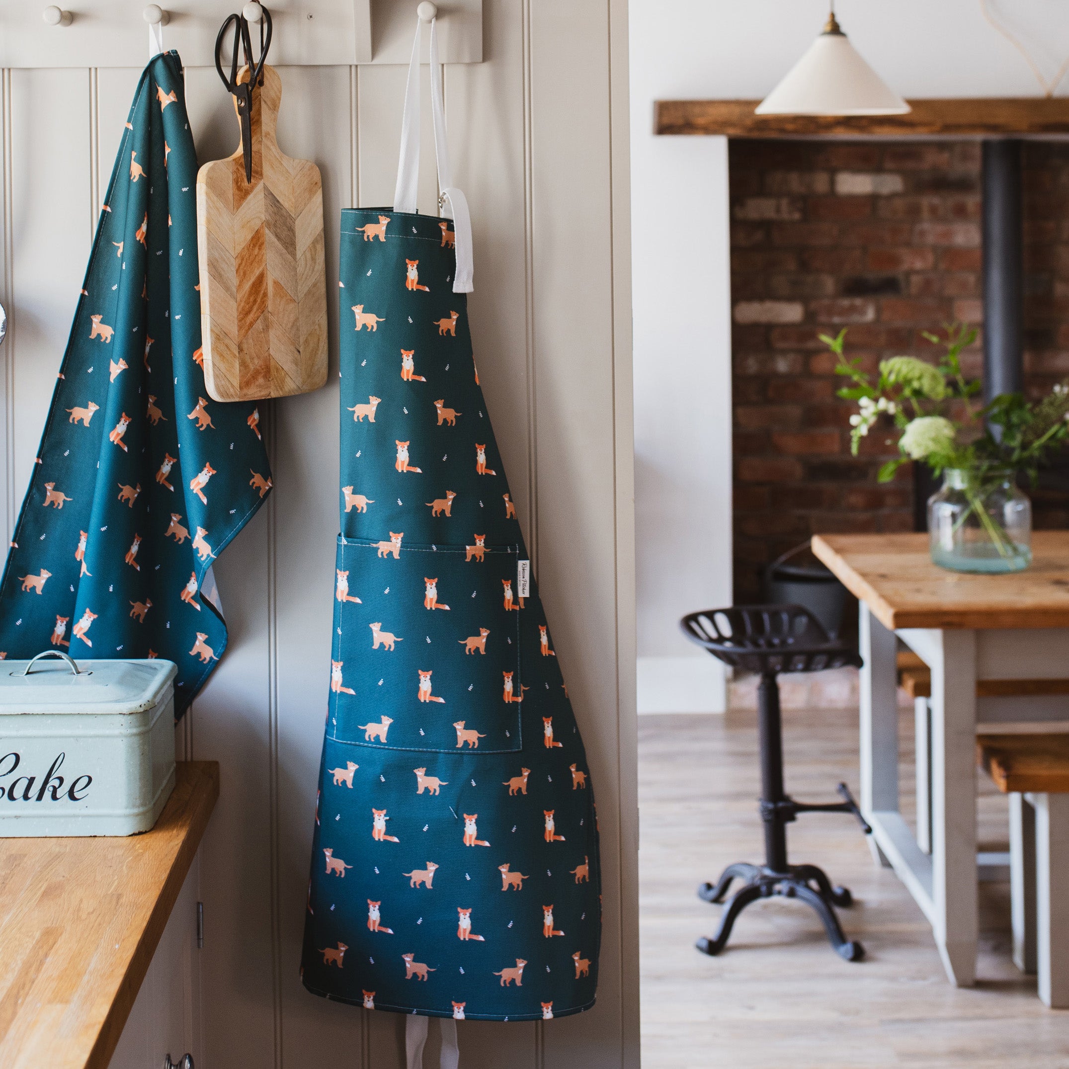 Dark Green Fox Apron in a Country Kitchen