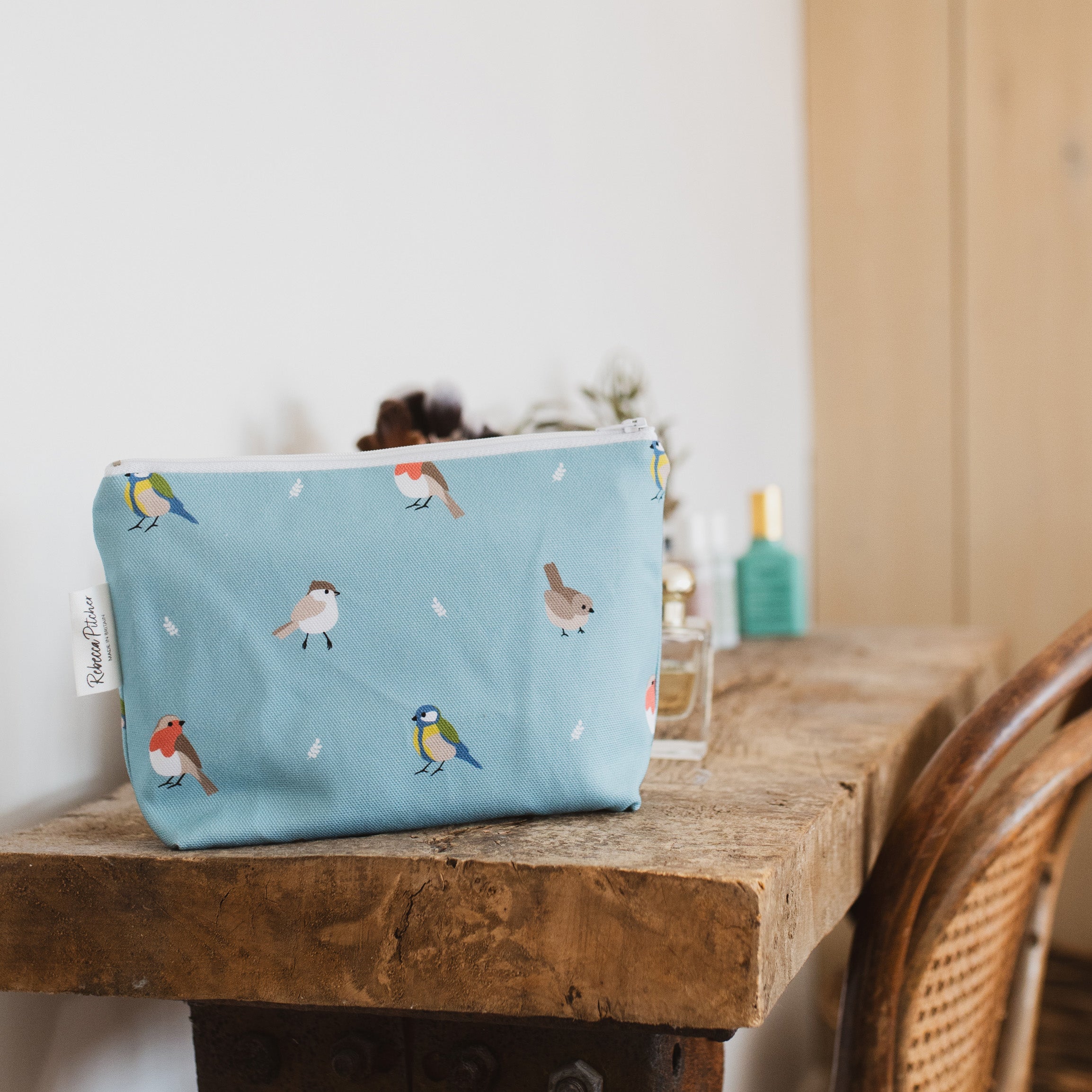 ocean blue garden bird makeup bag