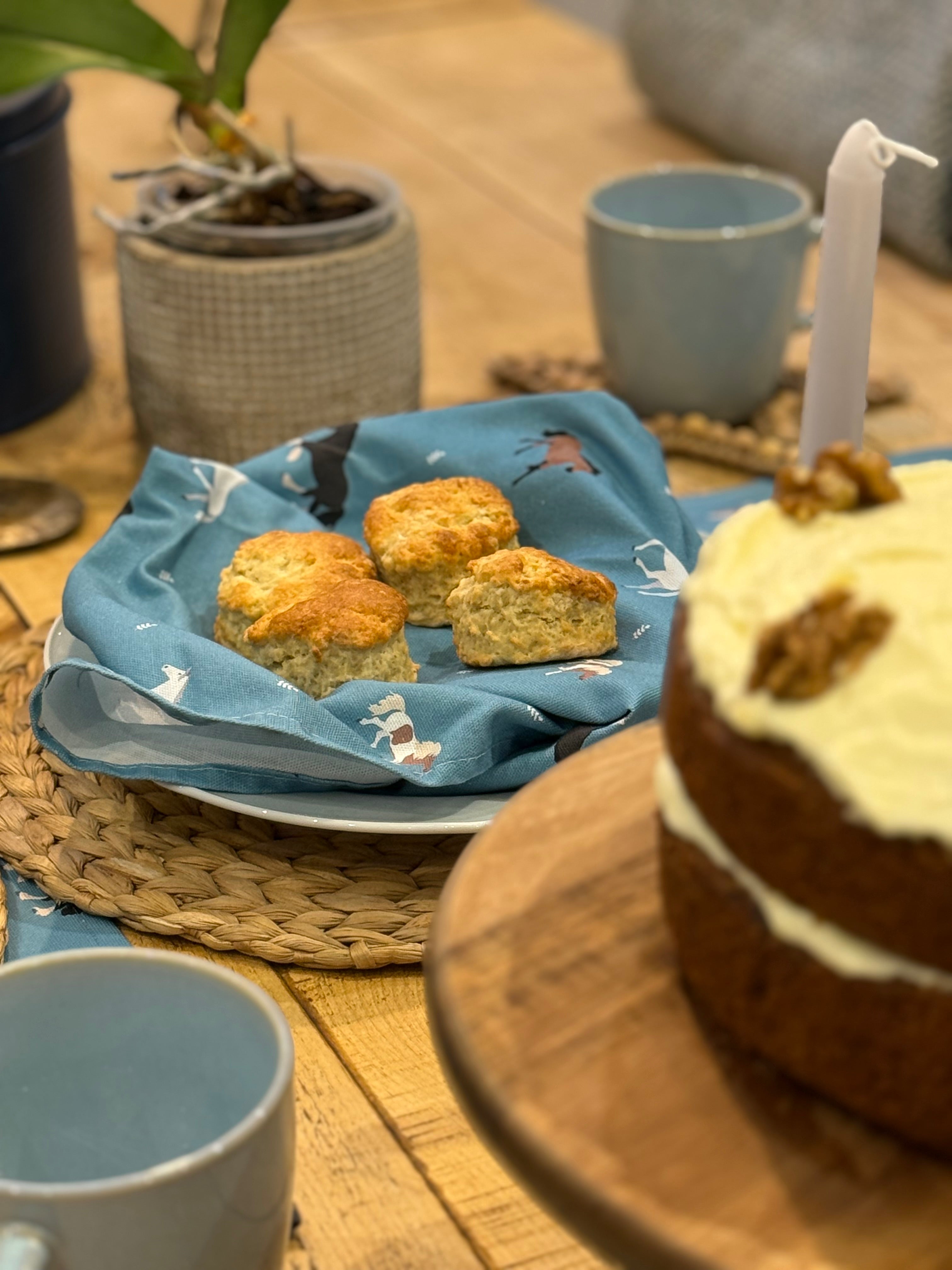 Horses design cotton napkin with scones and a cake