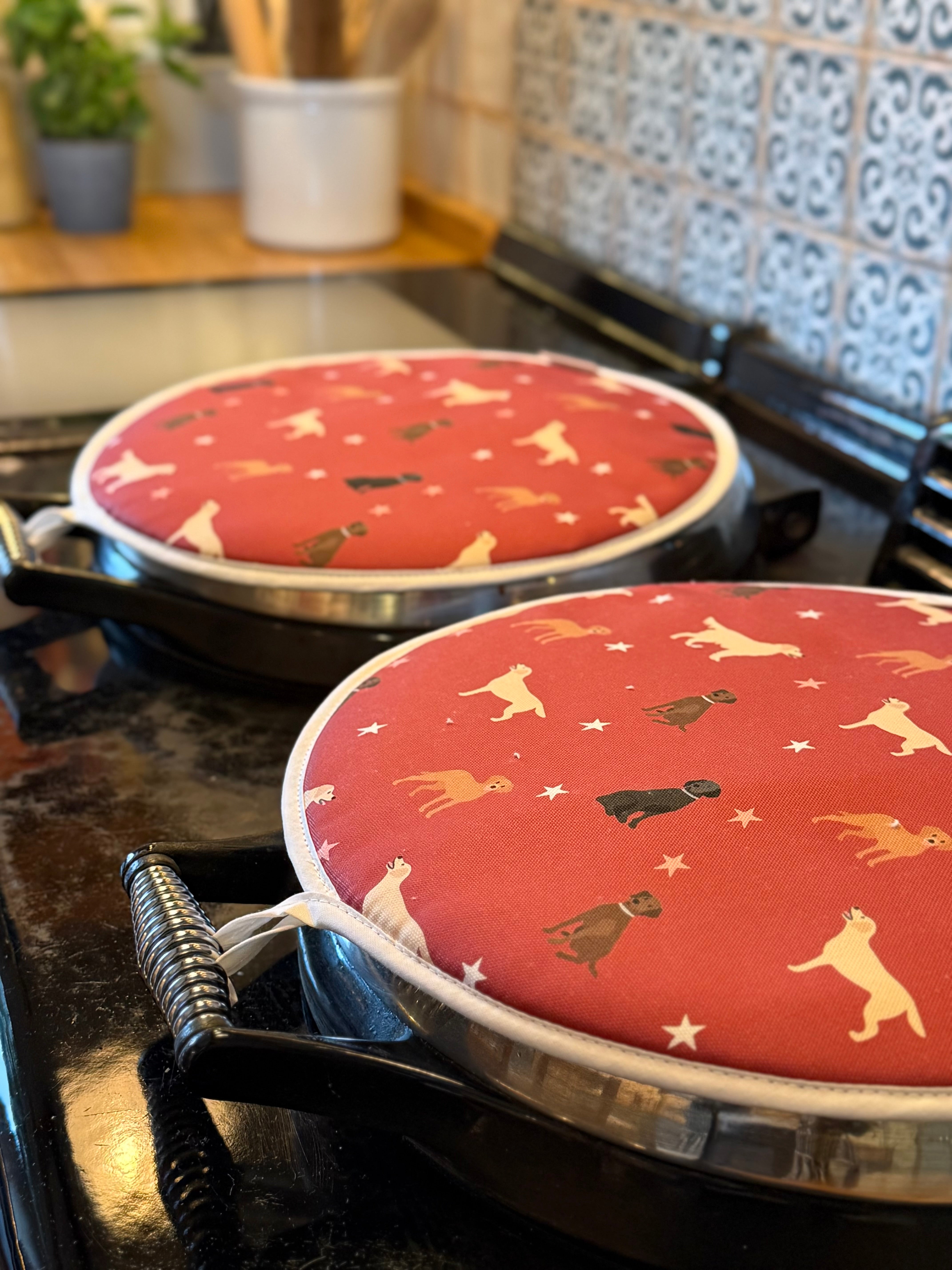 Red labrador pattern hob covers on a country kitchen range coooker
