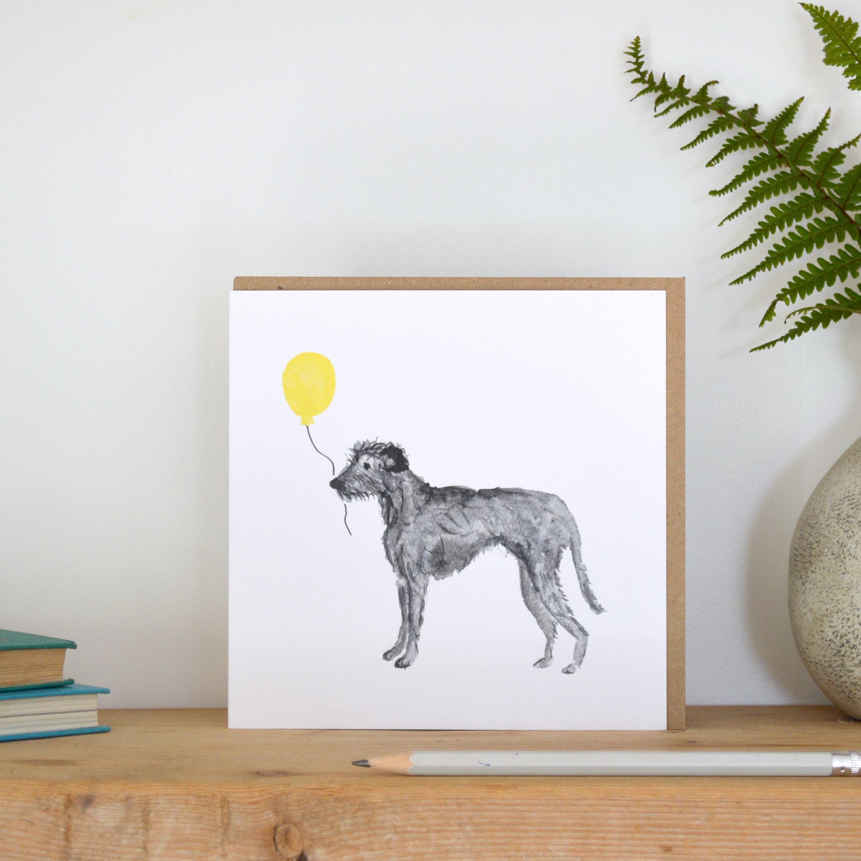 Grey Lurcher holding a balloon Card