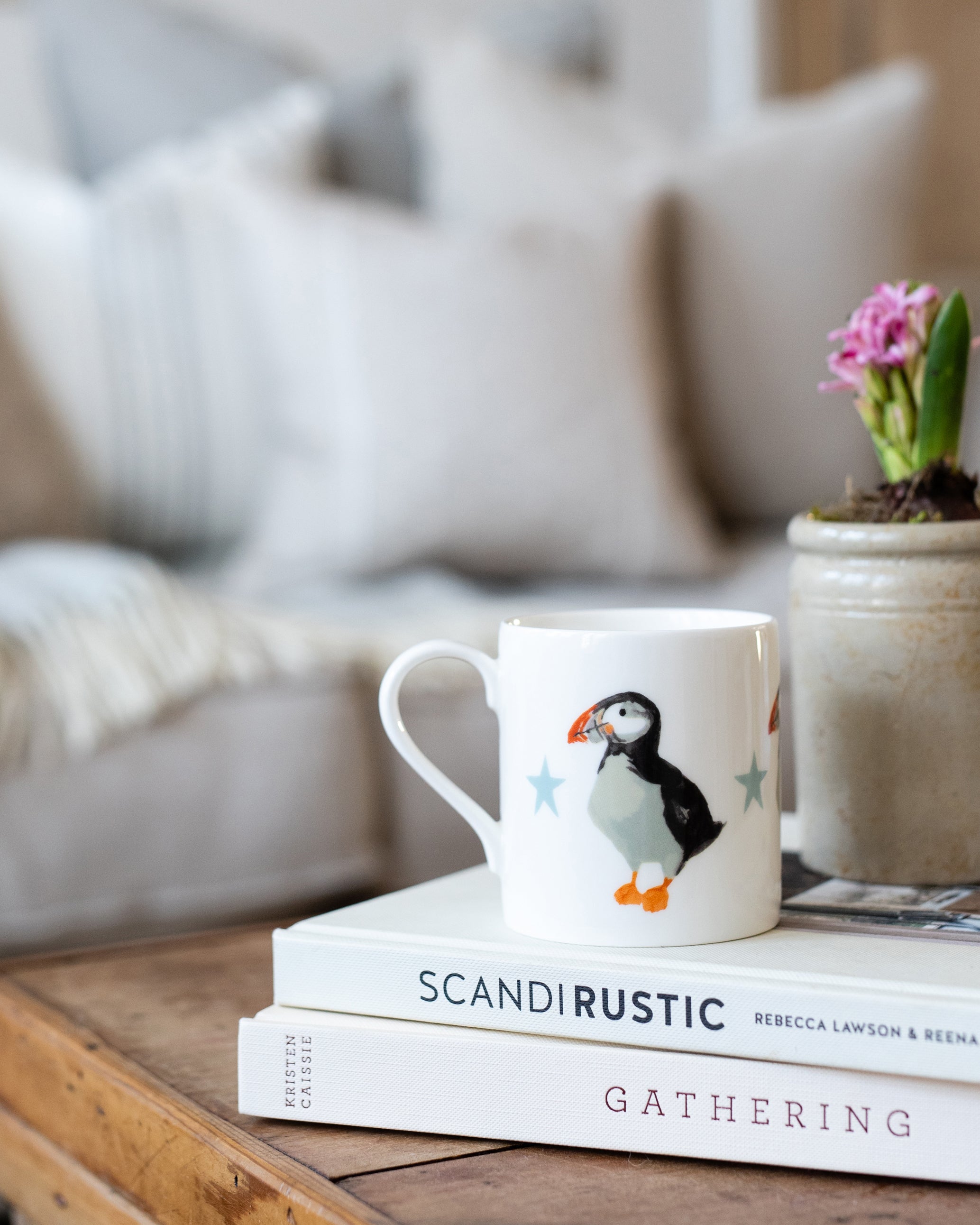 China Mug with puffin illustration in a living room setting